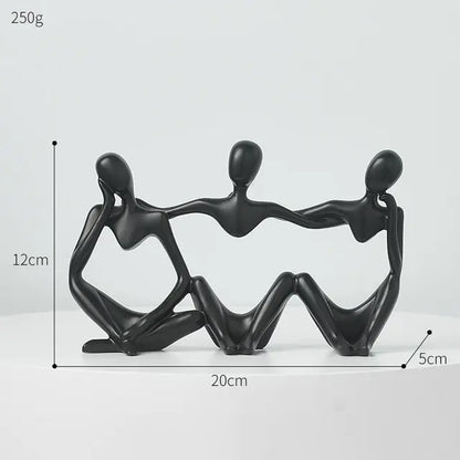 Three Nordic style decorative art figurines. Black colored, sitting and holding each other - Epiceasyshop1