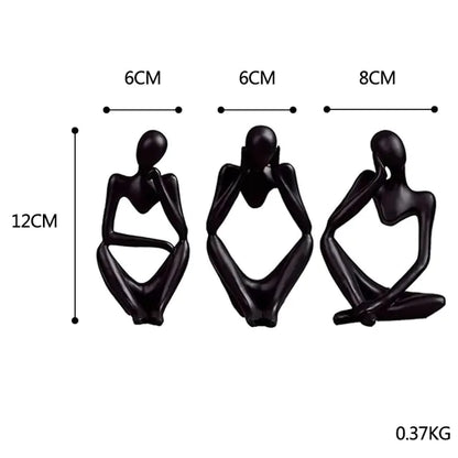 Three Nordic style decorative art figurines. Black colored, sitting next to each other with knee up- Epiceasyshop1